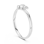Silver ring with a small diamond on a white background