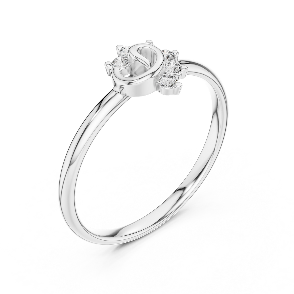 Silver ring with a heart-shaped center stone and smaller stones on a white background