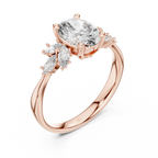 Rose gold ring with oval and marquise cut clear stones, elegant jewelry design