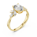 Gold ring with large oval gemstone and marquise-cut side stones on a decorative background