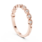 mozow x rose gold moissanite band ring angled perspective brilliant sparkle