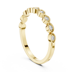 mozow x yellow gold moissanite wedding band angled perspective sparkle