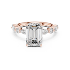Rose gold emerald cut moissanite halo ring with romantic warm tone