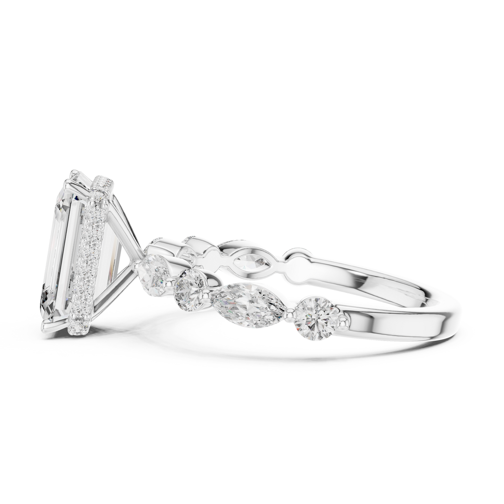 Luxury white gold emerald engagement ring with brilliant center stone