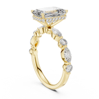 Yellow gold halo ring featuring bold emerald cut brilliance