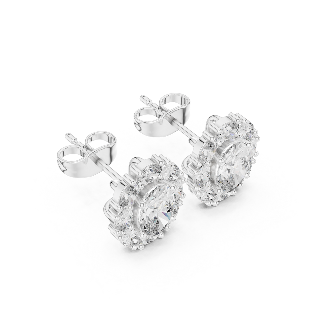White gold oval floral halo earrings angled view