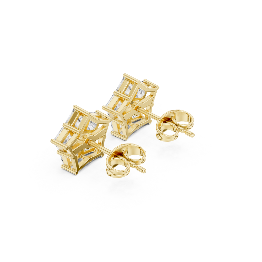 Gold cage-style earrings on a white background