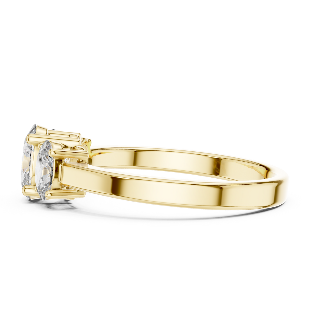 Yellow gold oval trilogy engagement ring prong setting side detail