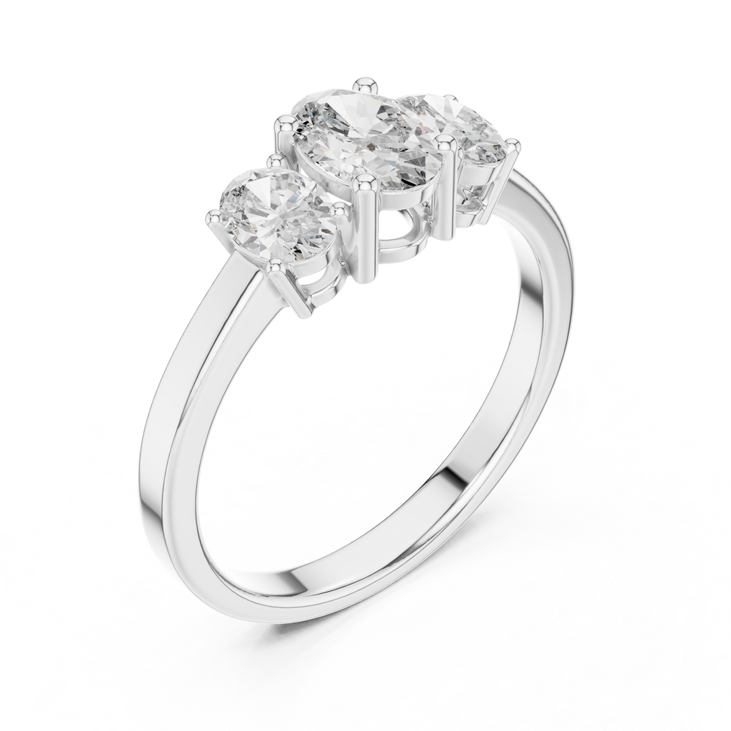 Angled white gold three stone oval proposal ring with brilliant sparkle