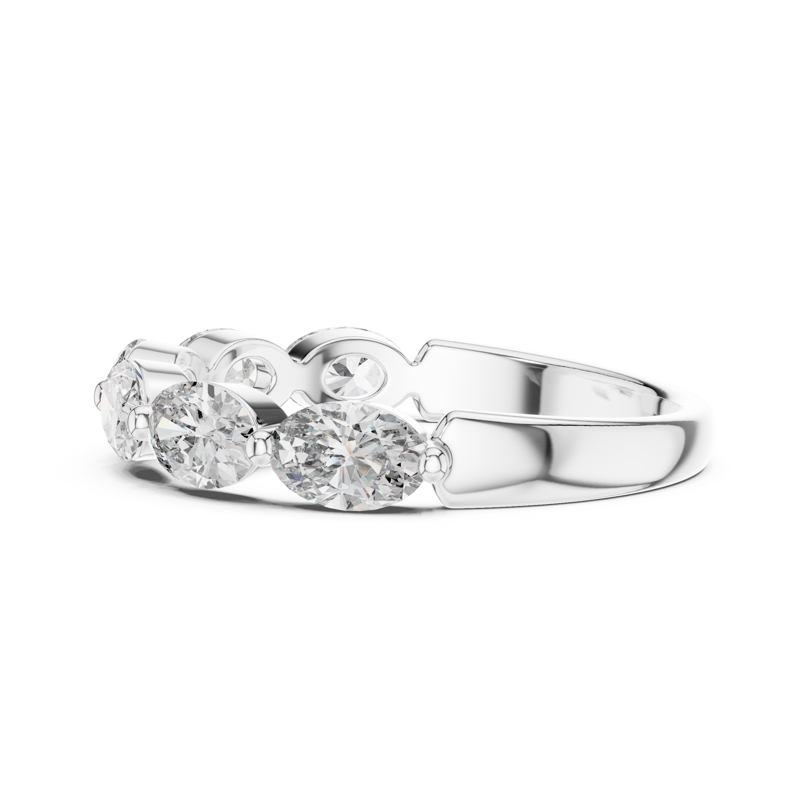 Silver ring with three clear gemstones on a white background