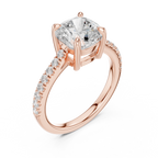 Angled rose gold cushion cut engagement ring sparkling pavé band