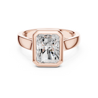 Rose gold radiant cut men’s ring with elegant bezel setting and contemporary style