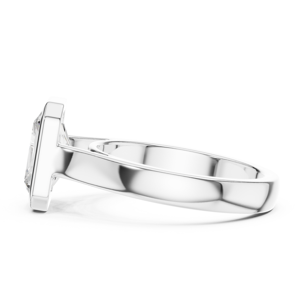 Modern white gold men’s statement ring featuring architectural edges and polished band