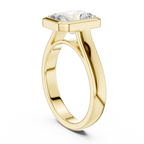 Bold yellow gold men’s ring highlighting modern masculine design and sharp corners