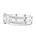 Silver ring with diamond accents on a white background