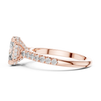 Side profile rose gold oval engagement ring showing hidden halo and elevated setting