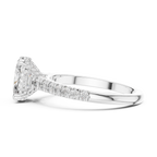 Side profile white gold oval engagement ring showing hidden halo under gallery