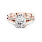 Rose gold oval solitaire split shank ring front view
