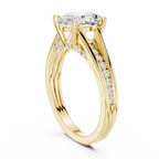 Yellow gold oval ring close up prong setting detail