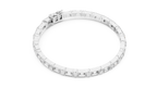 Silver bracelet with clear stones on a white background
