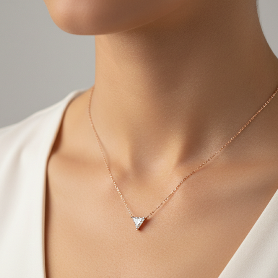 Necklace with a triangular pendant on a mannequin