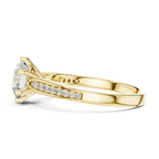 Side profile of yellow gold solitaire ring showing prong setting and slim shank