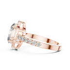 Side profile of rose gold pavé band ring showing elevated oval center stone