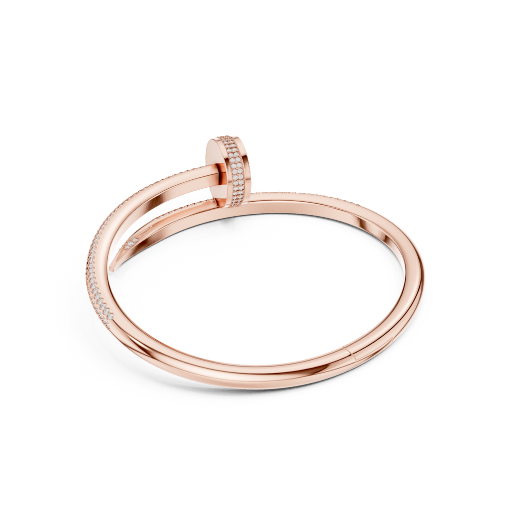 Rose gold ring with diamond accents on a white background