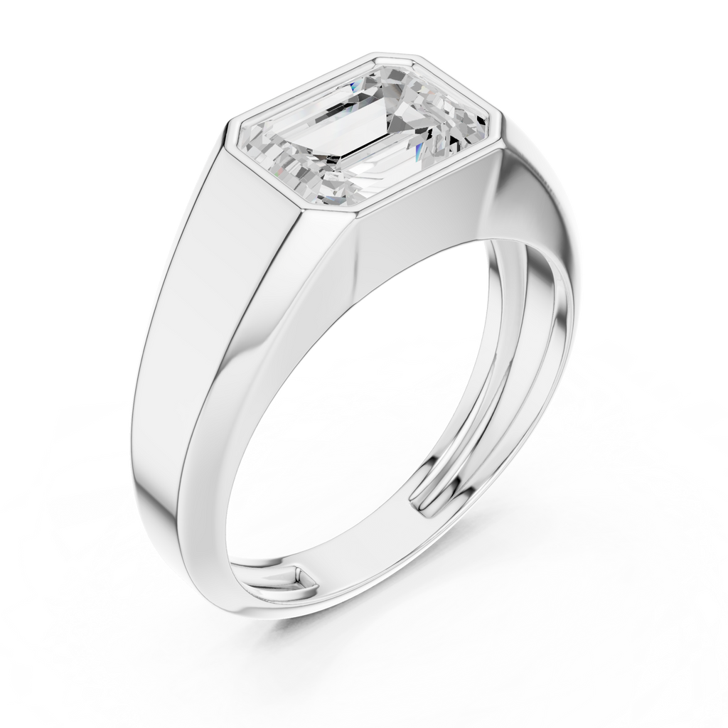Luxury white gold men’s statement ring featuring sleek bezel setting and strong masculine shoulders