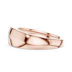 Rose gold men’s bezel ring showcasing thick band detailing and smooth polish