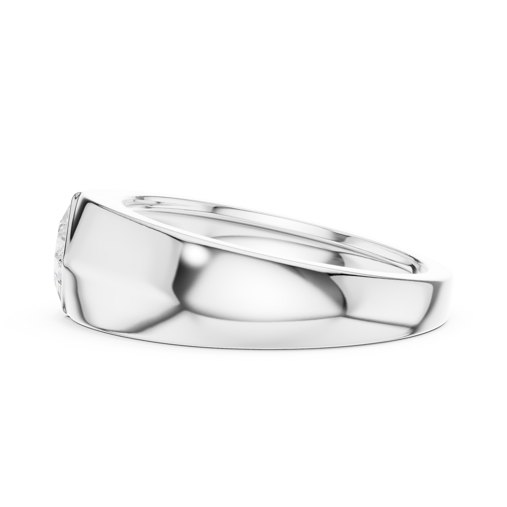 White gold bezel set men’s ring showing thick tapered band and strong masculine profile