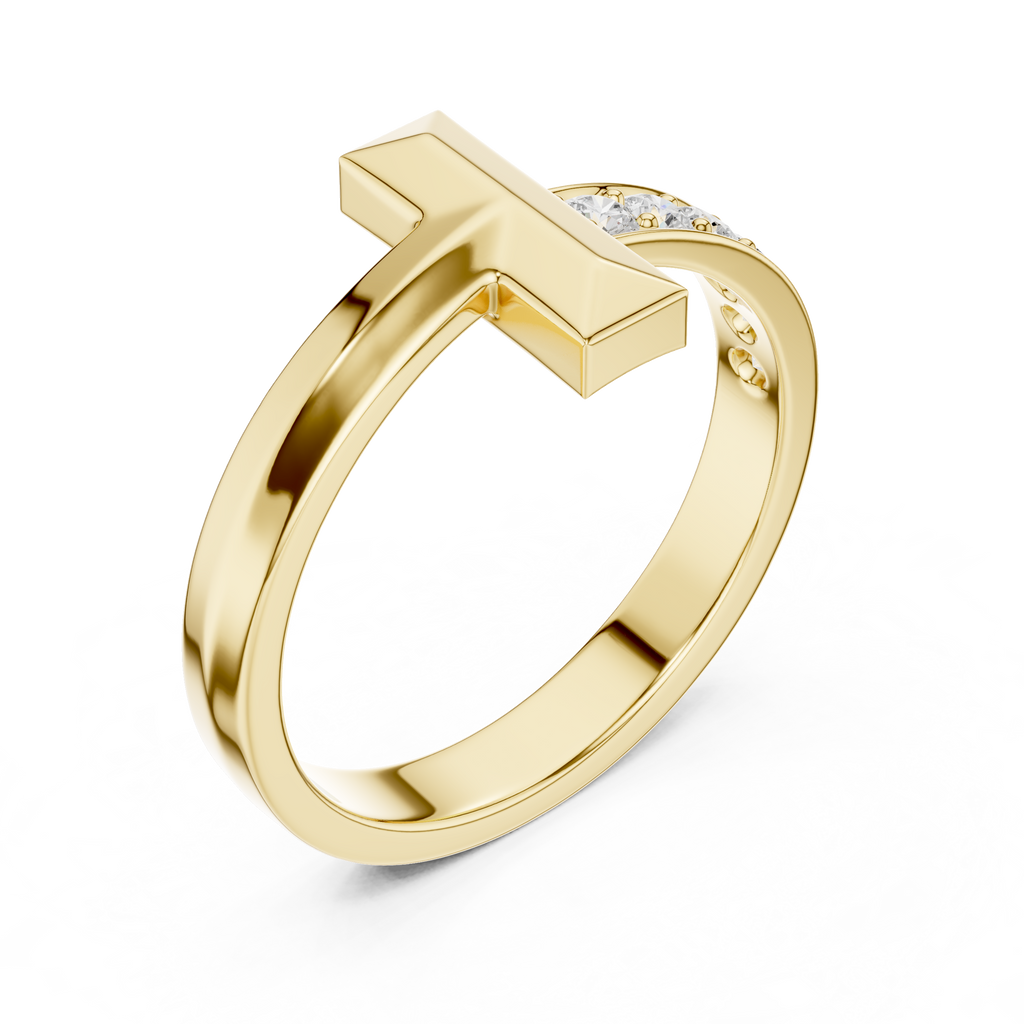 Gold ring with a cross design on a white background