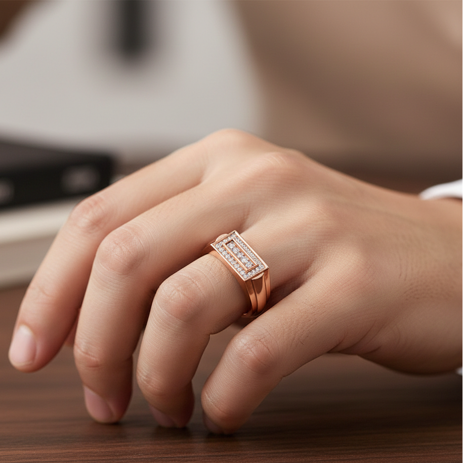 Rose gold ring with diamonds on a hand resting on a wooden surface