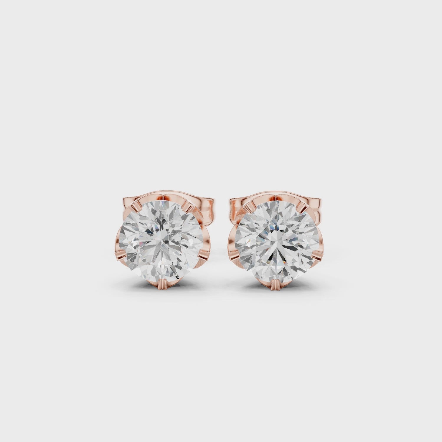 rose gold round moissanite lotus earrings full 360 rotation video