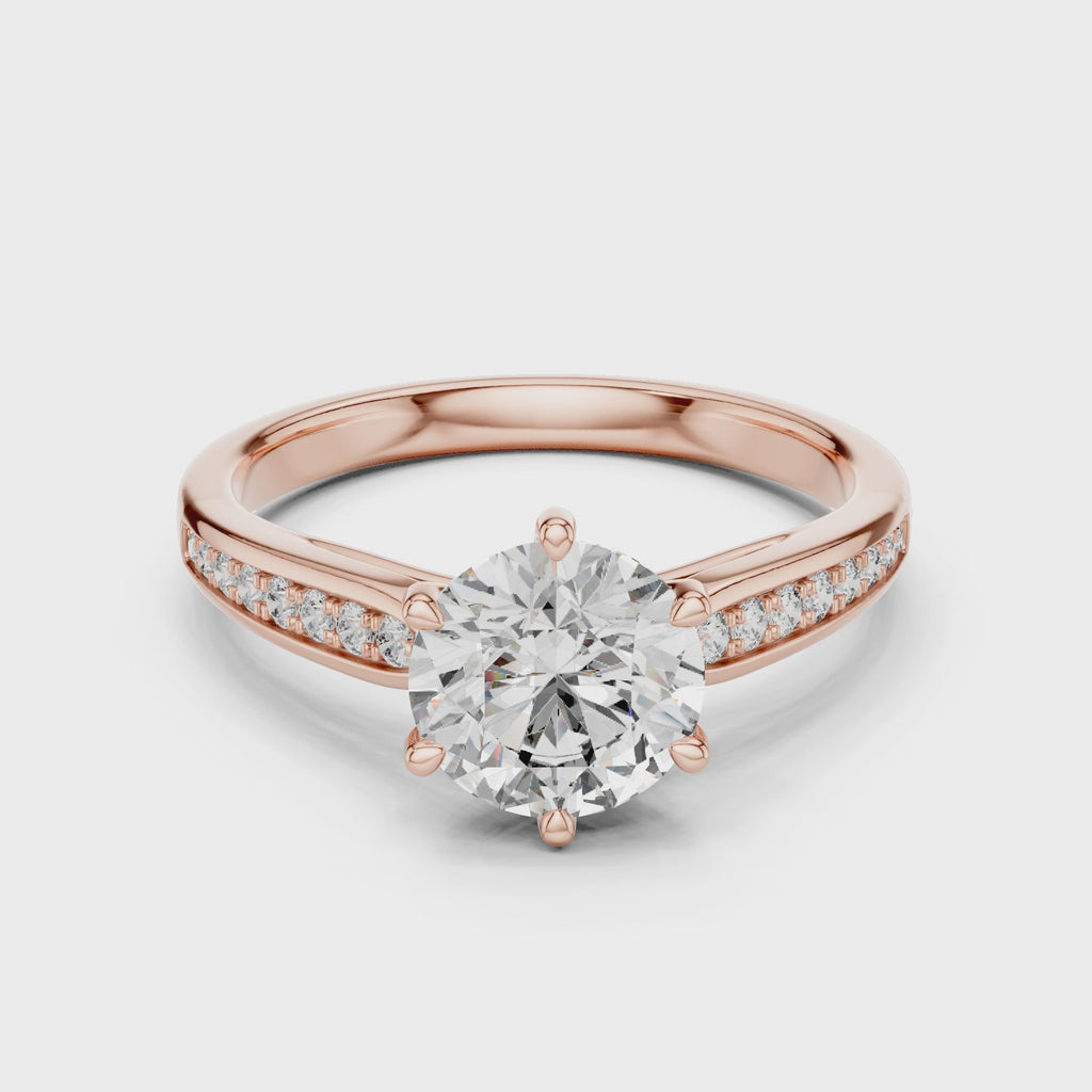 360 degree rotating view of Mozow X moissanite solitaire ring in rose gold