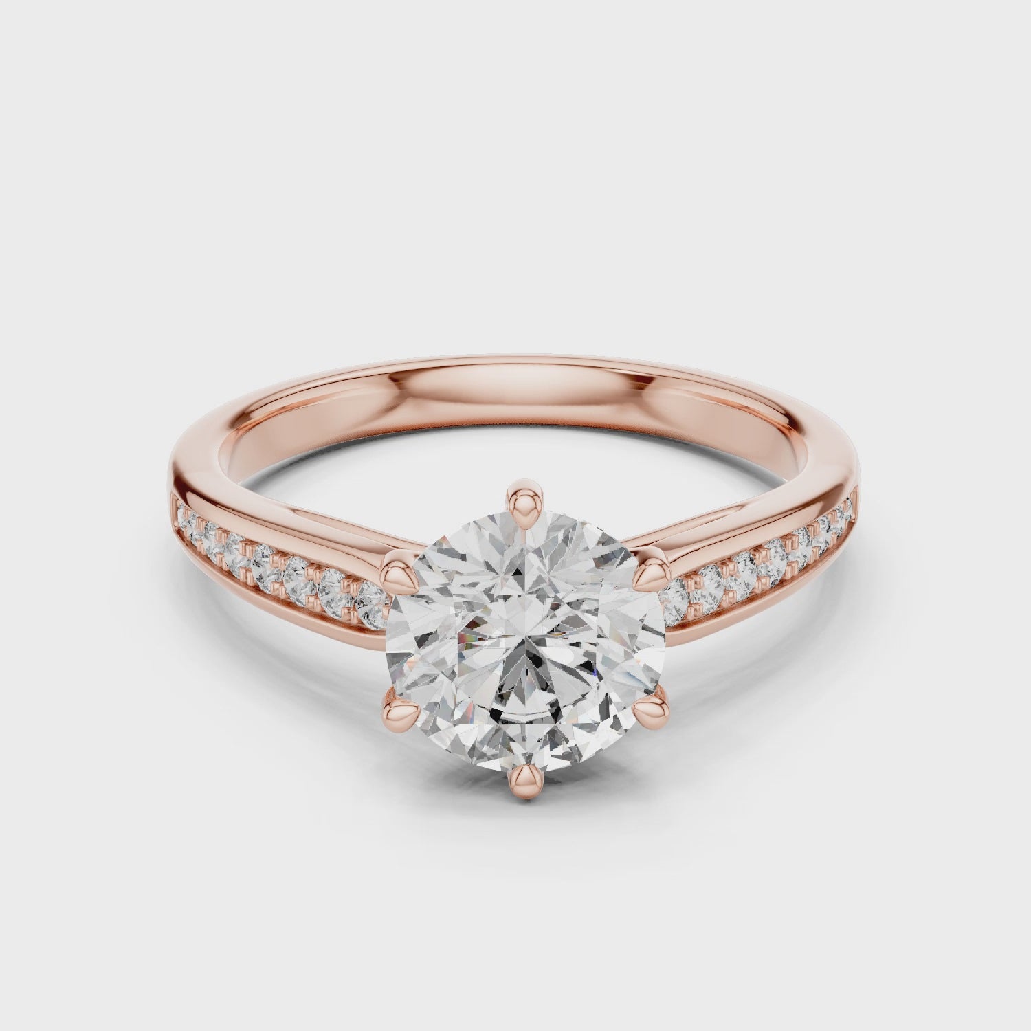 360 degree rotating view of Mozow X moissanite solitaire ring in rose gold