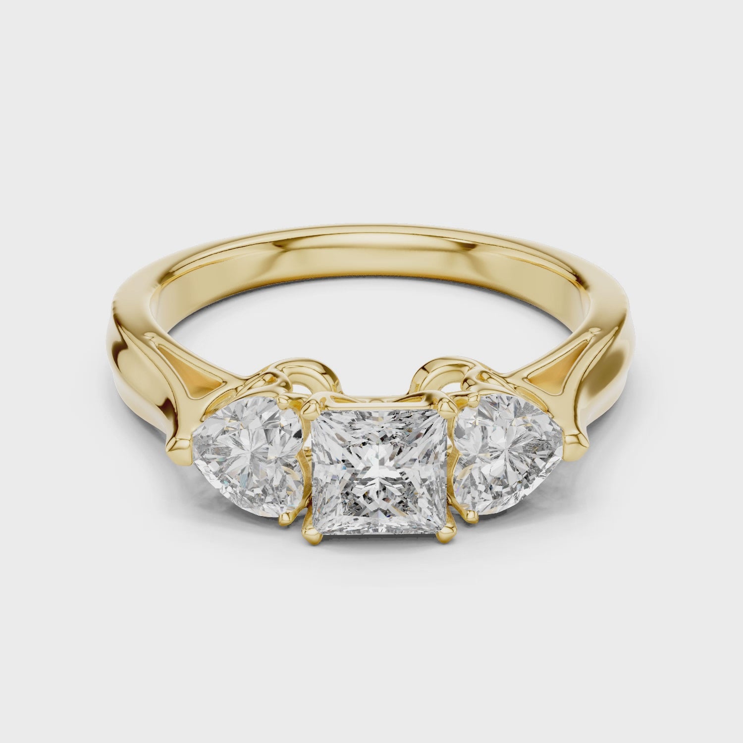 Princess Cut Center and Heart Side Stones Three Stone Moissanite Ring in Yellow Gold – 1.27ct – 360 Degree Rotating View