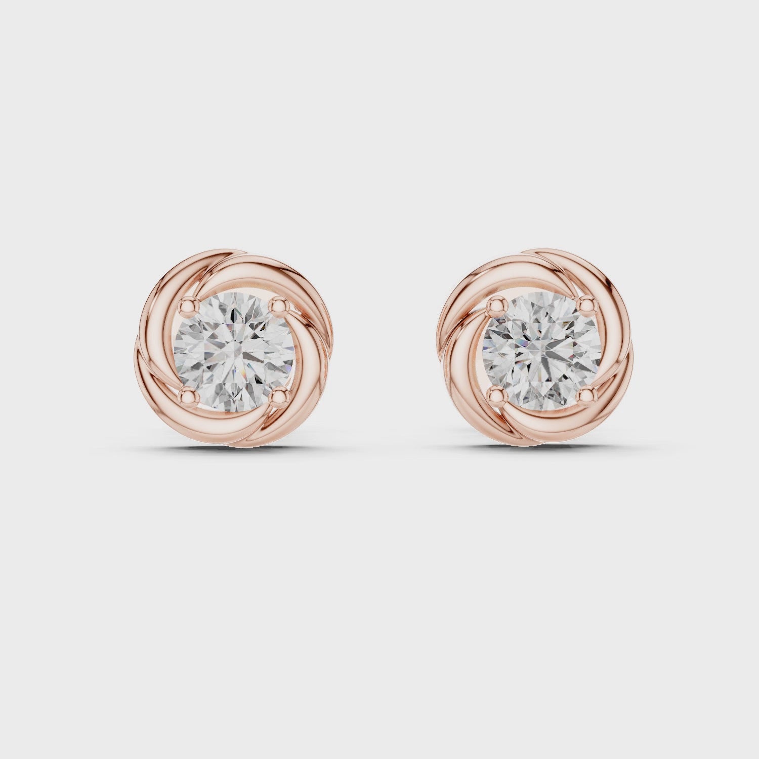 Mozow X twisted halo solitaire earrings rotating view rose gold