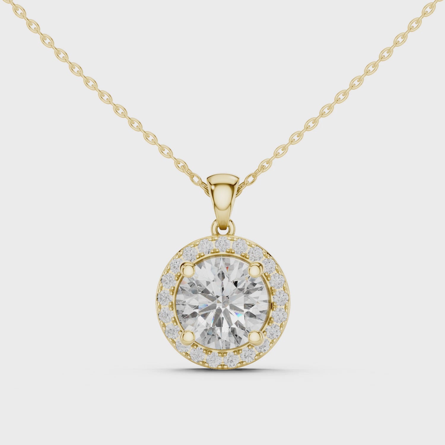 Yellow gold round halo pendant 360 degree rotating view
