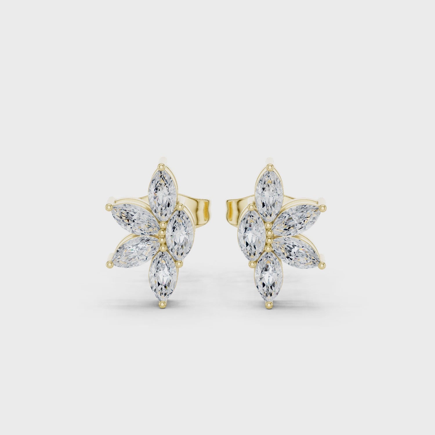 Yellow gold marquise moissanite cluster earrings 360 product video
