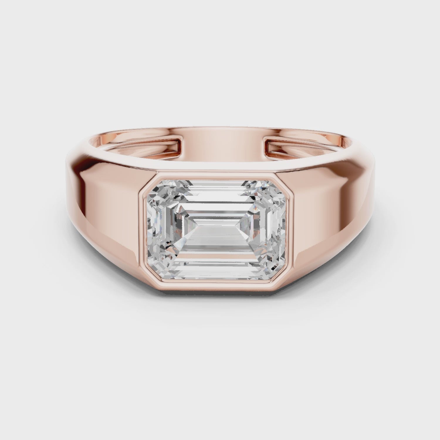 Complete 360 view of rose gold emerald cut men’s luxury ring with structured modern design