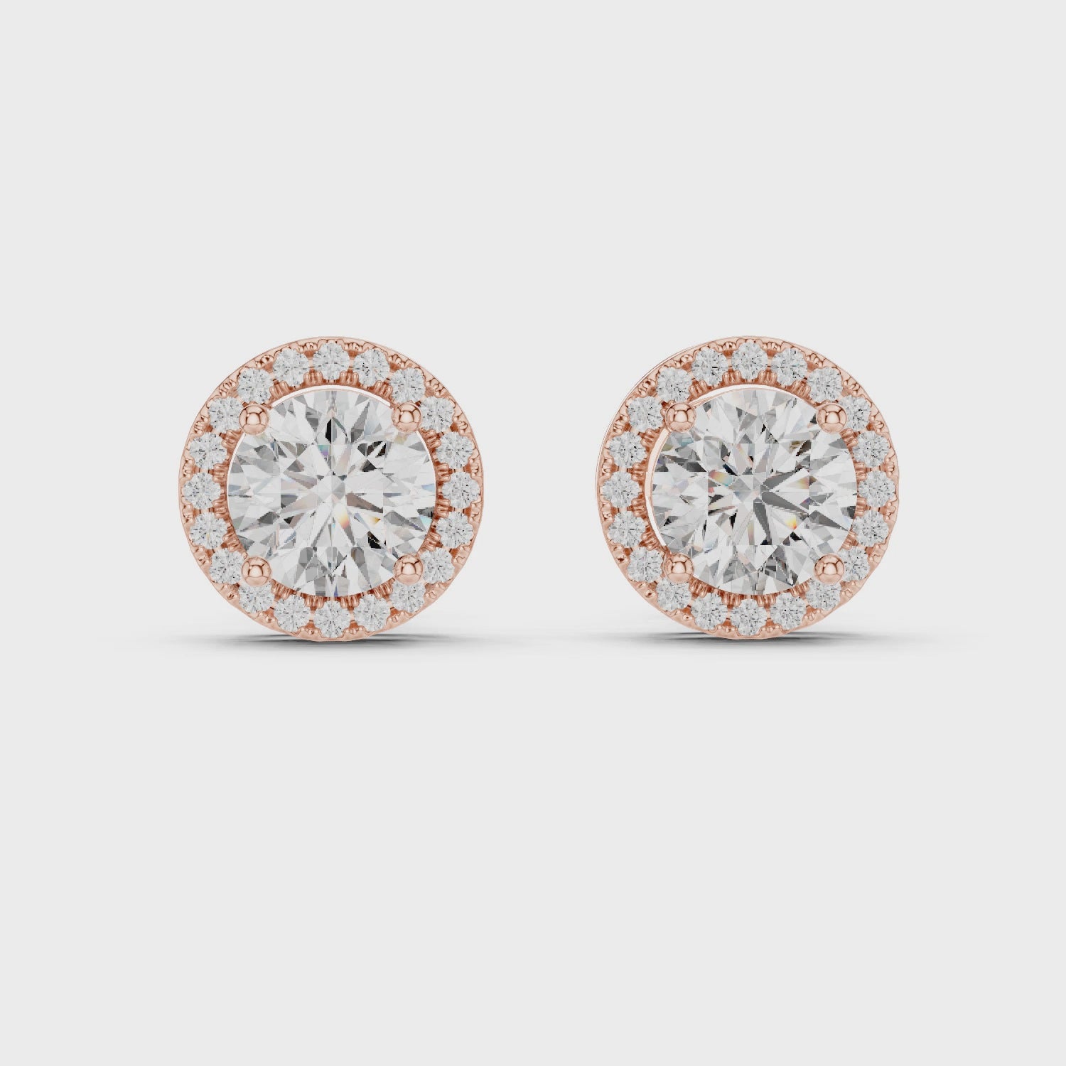 Rose gold halo stud earrings 360 rotation luxury sparkle view