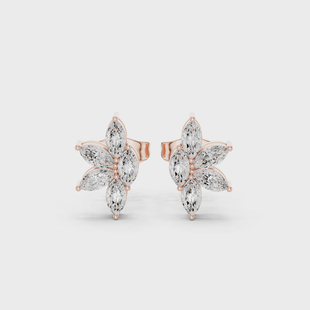 Rose gold floral moissanite stud earrings full 360 rotation view