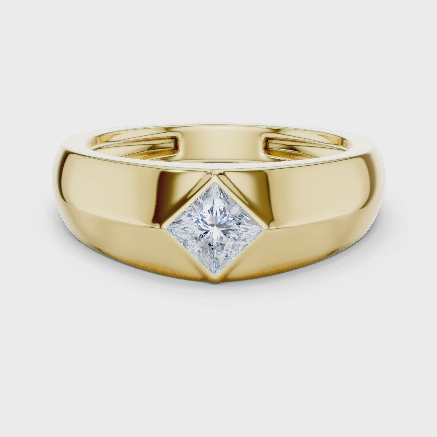 Full rotation video of yellow gold men’s square statement ring with light bezel frame