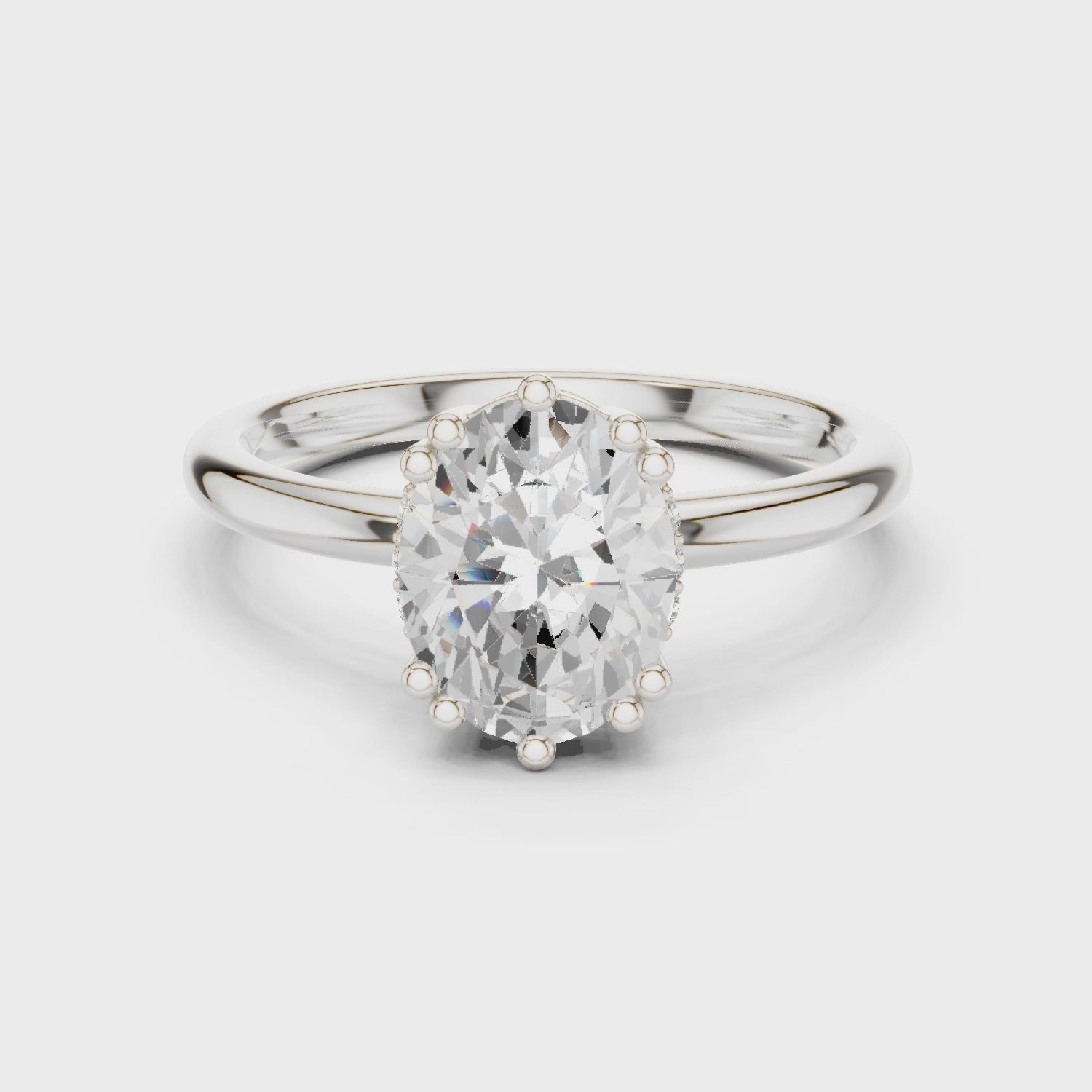 white gold oval hidden halo ring 360 degree rotating view
