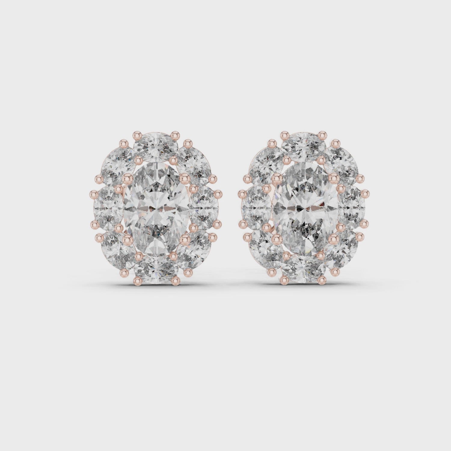 360 degree rotating rose gold oval halo moissanite stud earrings