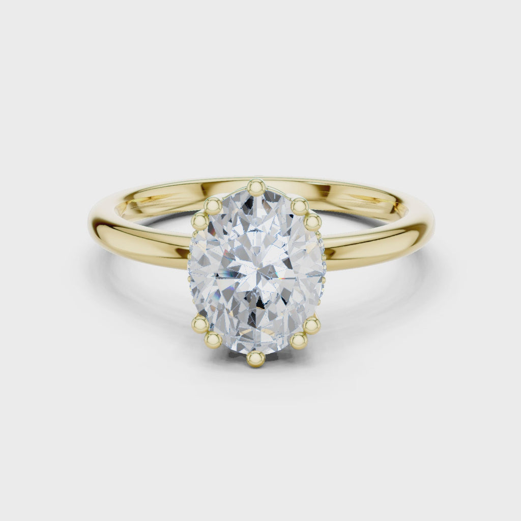 yellow gold oval hidden halo engagement ring 360 rotation