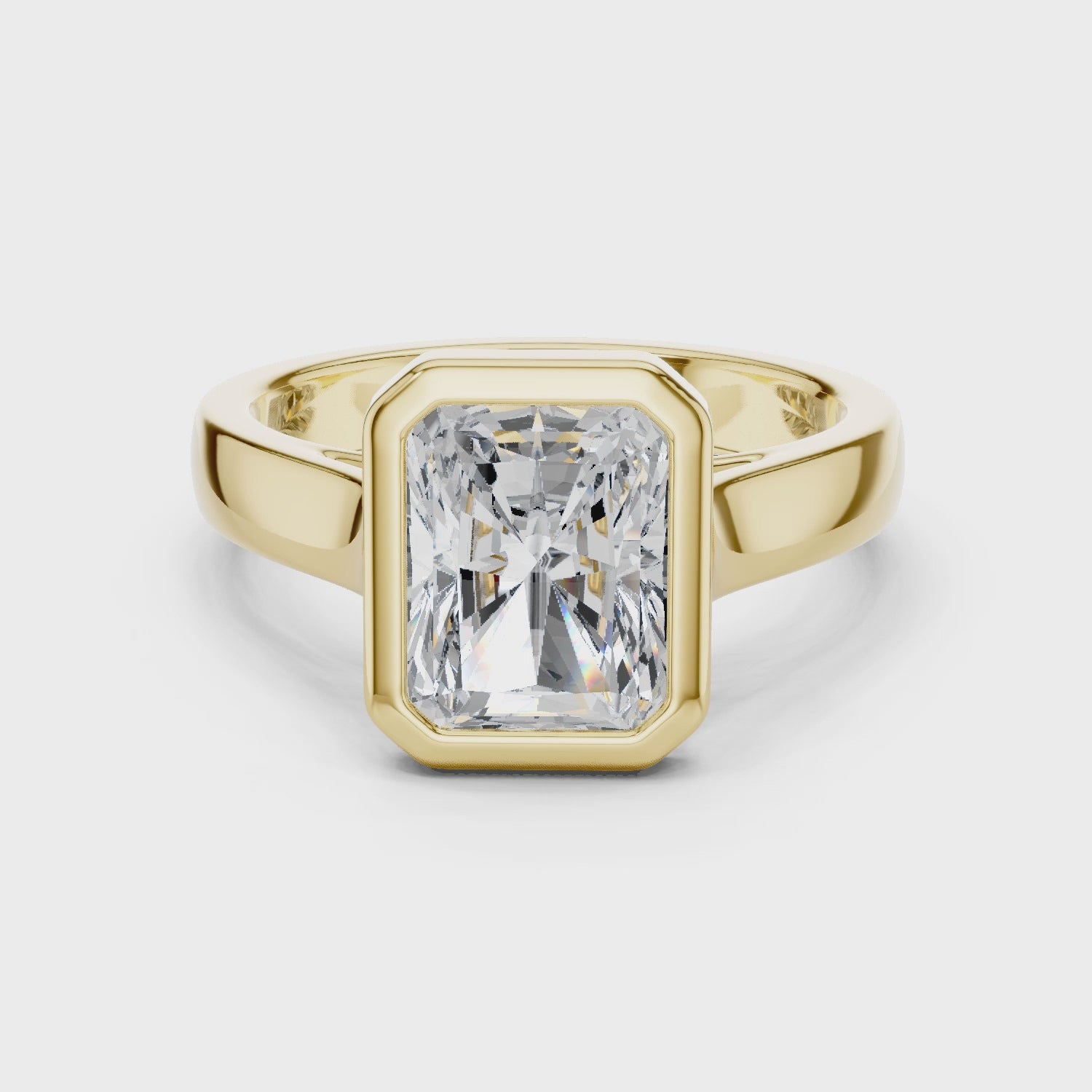 Full rotation video of yellow gold men’s radiant statement ring with structured frame