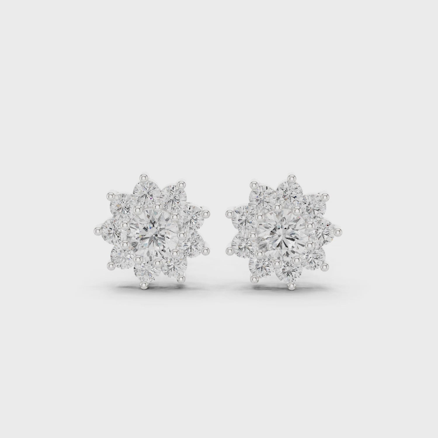 mozow x white gold floral halo moissanite stud earrings 360 rotating jewelry view