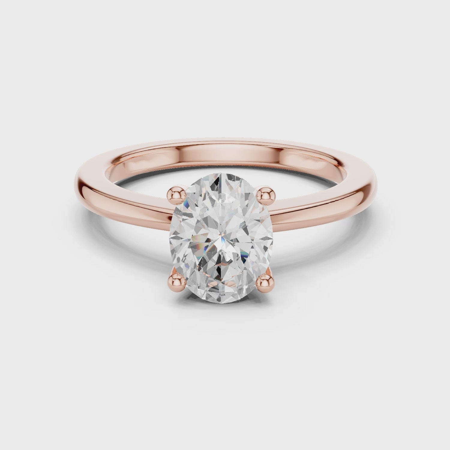 360 degree rotating rose gold oval moissanite solitaire ring with romantic finish